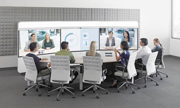 Cisco IX5000 immersive TelePresence room with a triple-screen video wall